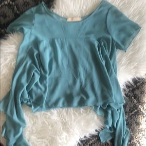 Soft blue waterfall hem blouse